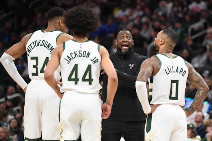 Milwaukee Bucks head coach Adrian Griffin talks to Giannis, Damian Lillard,and Andre Jackson Jr.